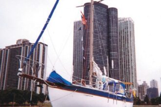 Chicago makes a fine backdrop for Russ Oldfather’s Elohssa Repus. This name has a long story and is a “backward spelling,” as his partner Judie McGlinchey explains tactfully.