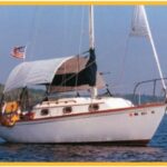 Dave and Jane Olson found their dreamboat, Sophie, resting in a barn in Wisconsin. They towed her home to Minneapolis, Minn., to sail on nearby Lake Minnetonka. One of their favorite additions is their “Conestoga-wagon-style awning” by Shadetree.