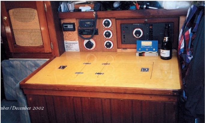 The finished navigation station which incorporates a refrigerator/freezer below the work table.
