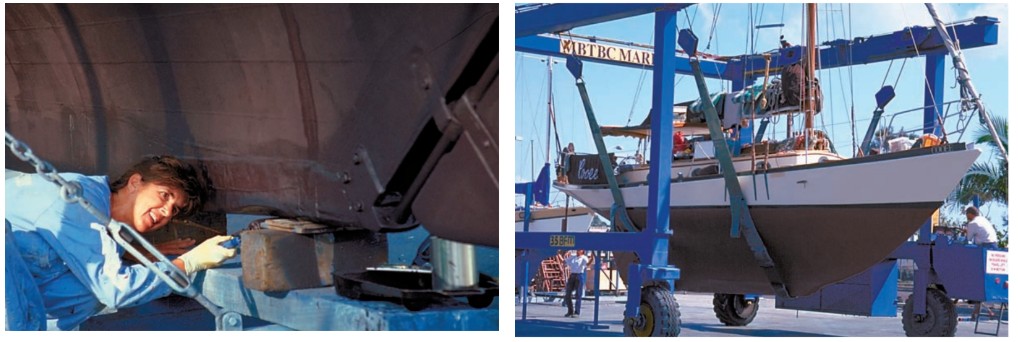 At left, this short section of Cooee’s keel is wood protected with a sheath of copper. Such luxury — Cooee’s first Travelift at Club Mykonos on South Africa’s west coast, right.