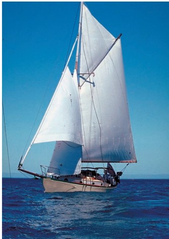 Cooee under sail, trying out her first roller-furling jib in Hout Bay, South Africa.