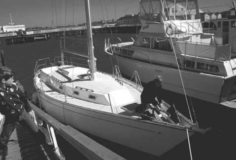 The brand-new Vixen at the dock in 1978. Son David, 11 at the time, watches Dick prepare the new boat.