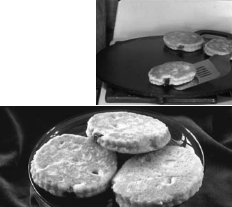 Stovetop baking at its best: Welsh cakes and the traditional bakestone called a maen (shown on stove above).