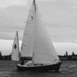Ted’s former Nimble, purchased when prices were right. (She was so new, in fact, that he hadn’t gotten around to sewing snaps on the mizzen for the ensign, as he discusses in the January issue.)