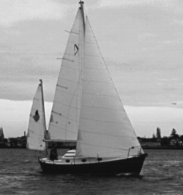 Ted’s former Nimble, purchased when prices were right. (She was so new, in fact, that he hadn’t gotten around to sewing snaps on the mizzen for the ensign, as he discusses in the January issue.)