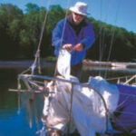 Picture of a man working on a boat