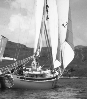 Reaching under all working sail.