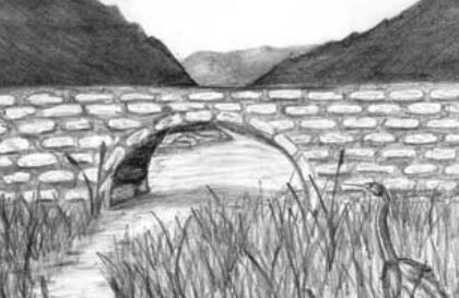 Picture of a river flowing through a cobble bridge