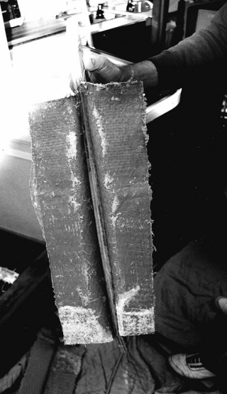 This secondary bond failed when yanked on with one hand. The builder didn’t pay attention to getting a good secondary bond and didn’t fillet the corners before tabbing.