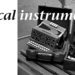 Picture of a sextant and a melodeon.