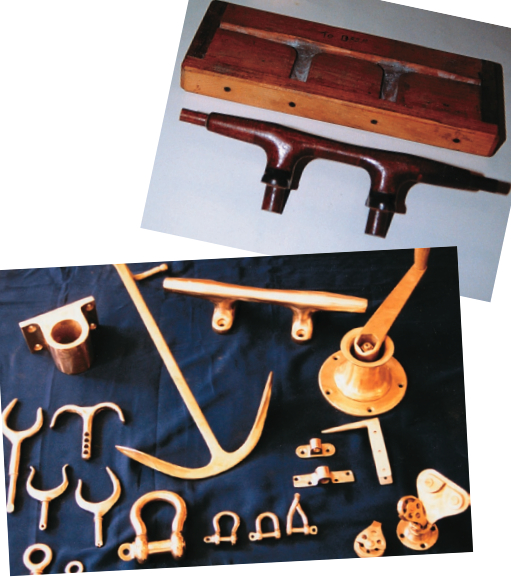 The casting pattern and core box for the hollow Herreshoff cleat, at top, and a collection of bronze pieces, above, worthy of display on any coffee table.