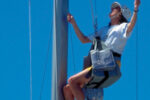 Picture of a woman up a mast