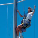Picture of a woman up a mast