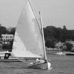 Picture of a boat sailing with a new mast