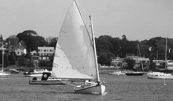Picture of a boat sailing with a new mast