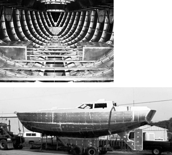 A look inside Troubador (top) while under construction, shows the shining ribs and curved frames of a fully developed aluminum hull. A visit to Troubador in the early stages might remind the uninitiated of a visit to a traditional wood shop — except for the missing aroma of sawdust and varnish. Troubador’s plating (bottom) shows details of an elaborate construction process.