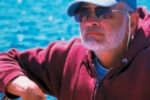 A picture of a man sailing