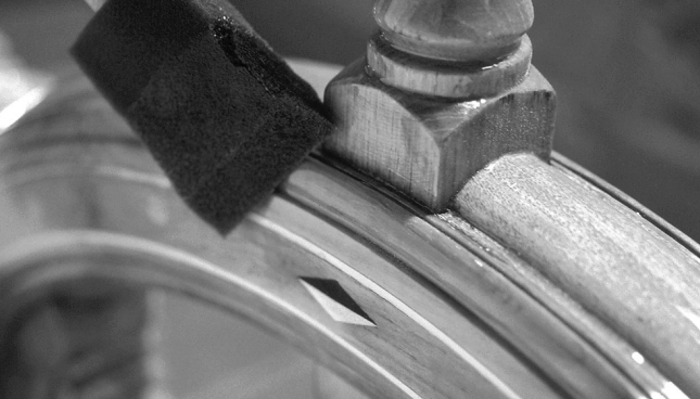 Beautiful brightwork makes beautiful boats. This shot, from the Independence Cherubini Company, shows the pains these craftsmen take to make their boats glow.