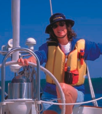 Picture of a woman sailing in a life vest