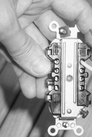 Commercial grade outlets have clamp terminals safe for stranded wire.