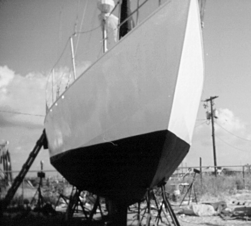 Millennium Falcon after repairs. Her double-chine hull gleams in the Texas sunlight. A Bruce Roberts design, this 44-foot center-cockpit ketch was built in 1978.