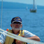 A picture of a man sailing